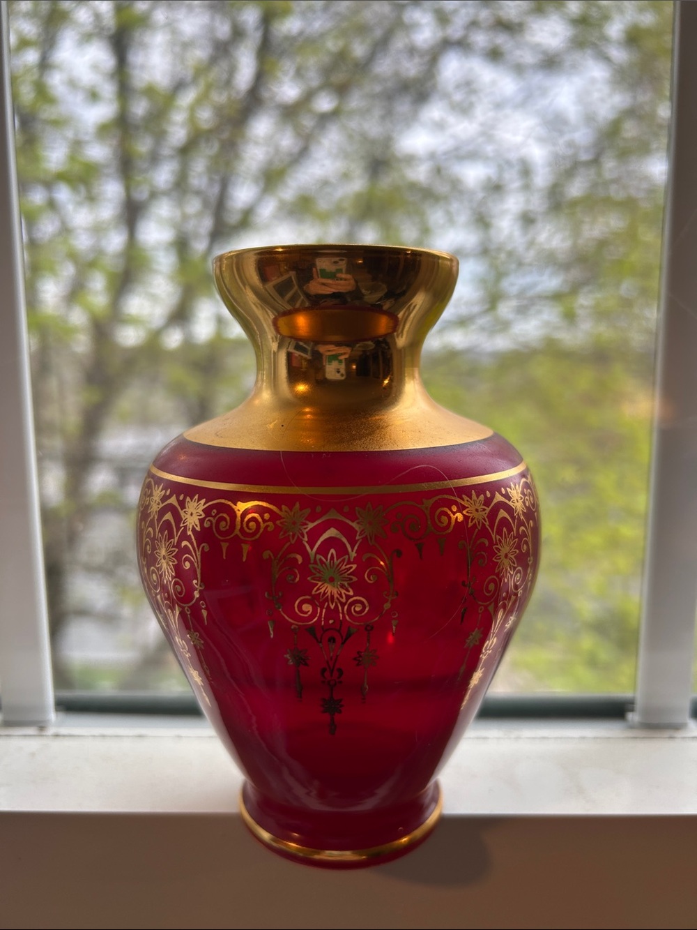 Murano ruby red art glass vase, 24k gold leaf trim, hand-painted gilt overlay.